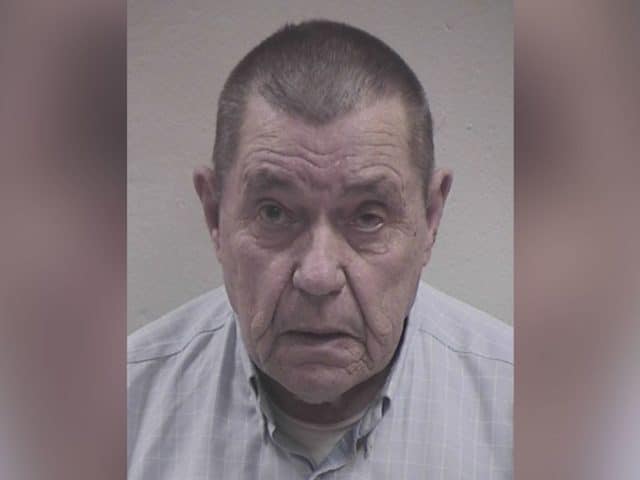 White homeowner accused of shooting a Black teen who rang his doorbell turns himself in to face criminal charges