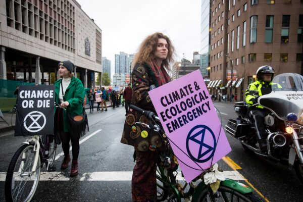 Climate Protesters Disrupt Democrats, Financiers, Big Tech at Energy Summit  at george magazine