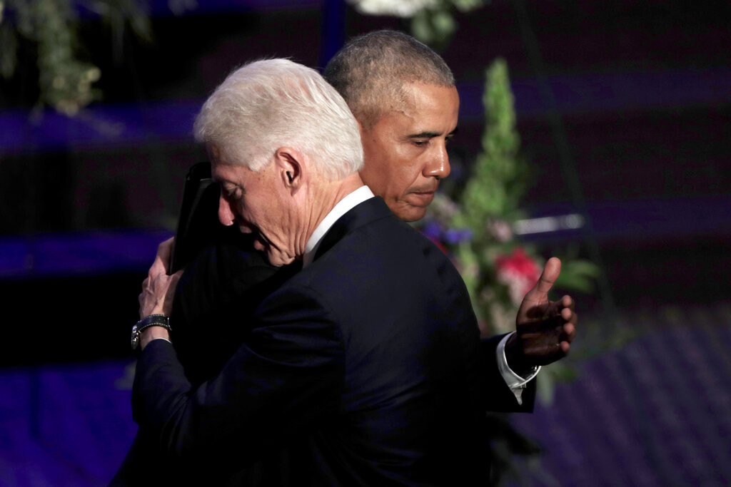Obama and Clinton look to boost Biden without overshadowing him  at george magazine