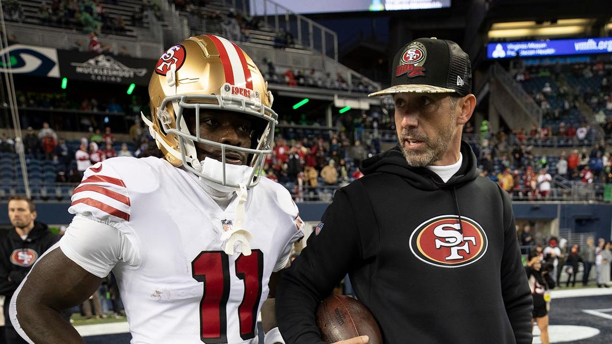 49ers' Kyle Shanahan, Brandon Aiyuk appear to have animated discussion over receiver's practice shorts  at george magazine