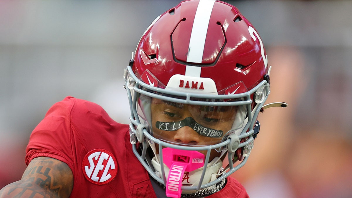 Alabama's 17-year-old star receiver writes blunt 2-word message on eye black ahead of breakout game  at george magazine