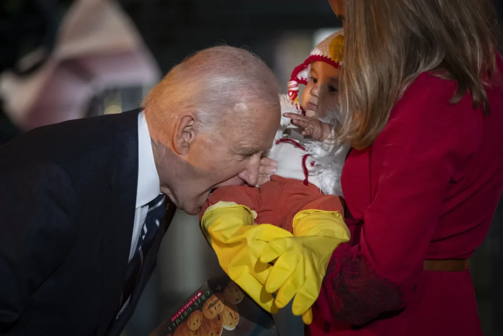 Biden slammed for taking a bite out of more than candy at White House Halloween