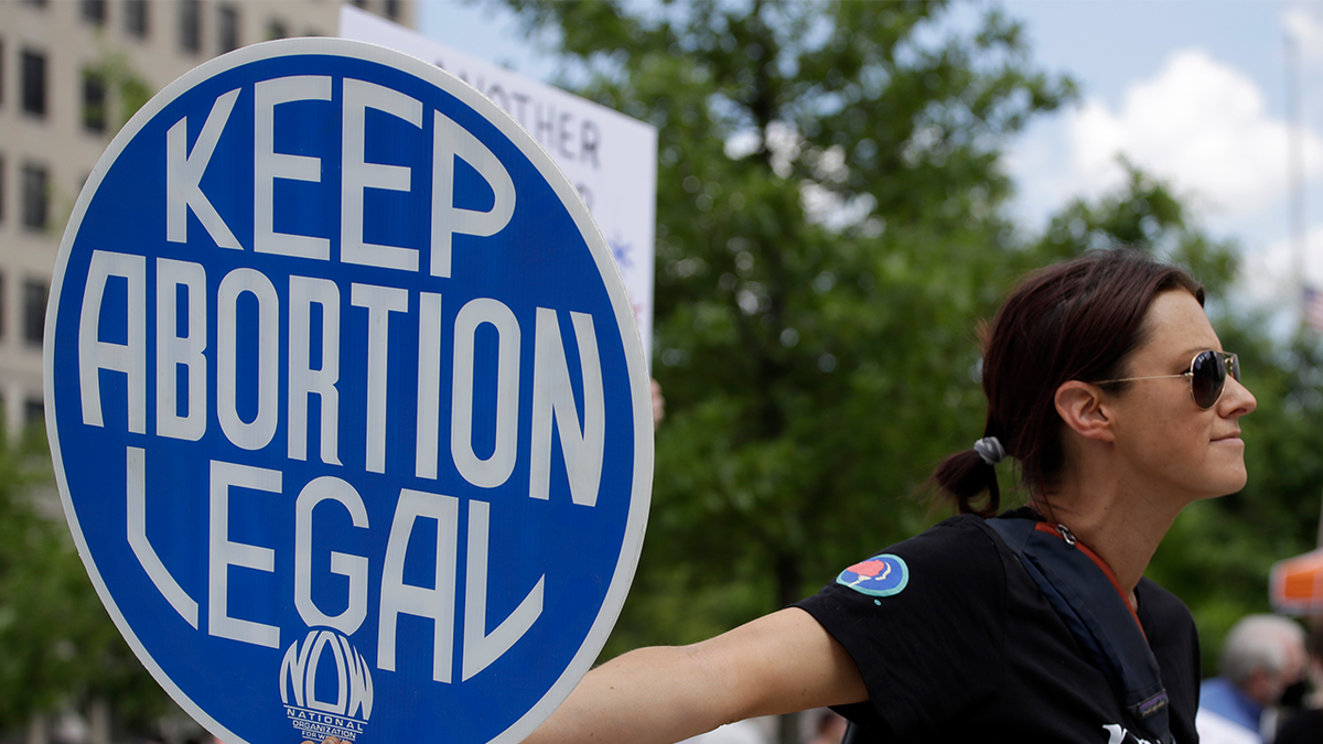 New Jersey Democrat proposes bill to create travel advisories to inform pregnant women of state abortion laws  at george magazine