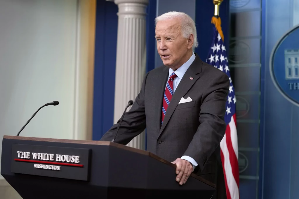 Biden makes surprise appearance at White House briefing to tout economy and port strike deal  at george magazine