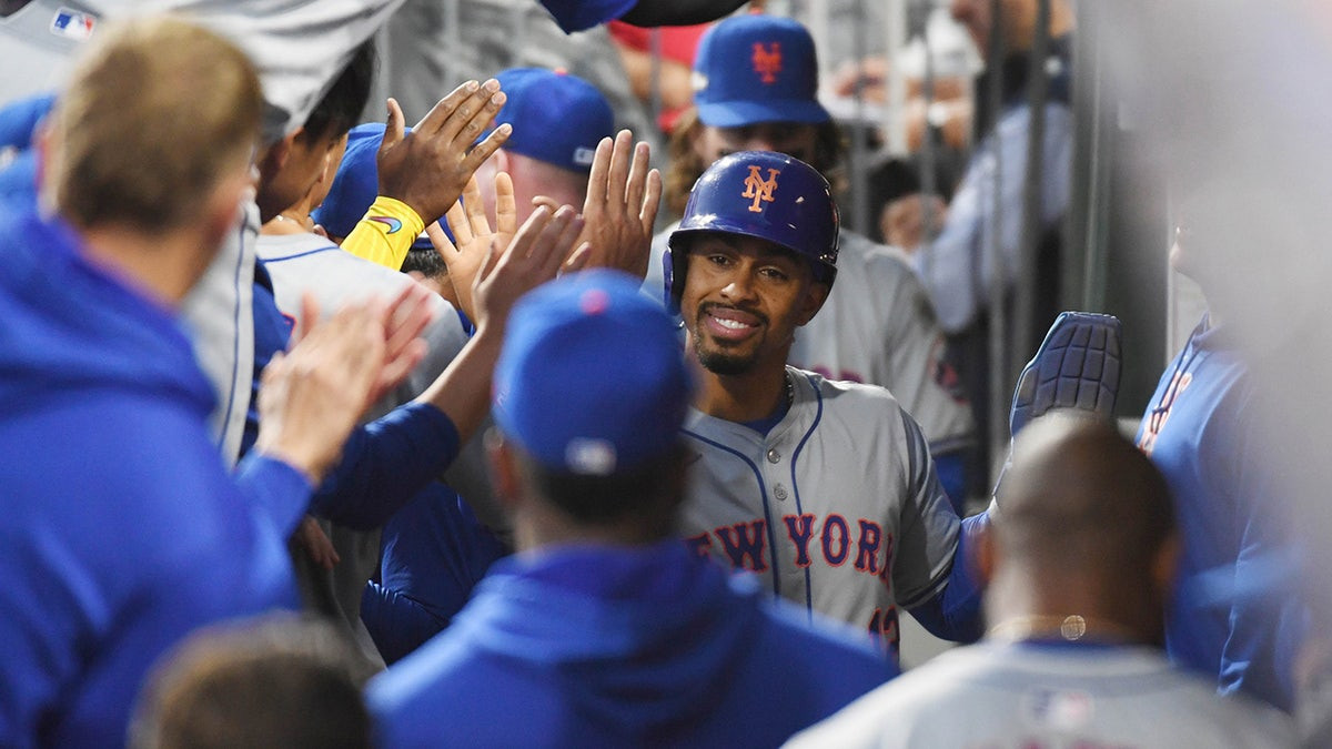 Mets' magic continues in NLDS with 5 runs in eighth for another comeback victory  at george magazine