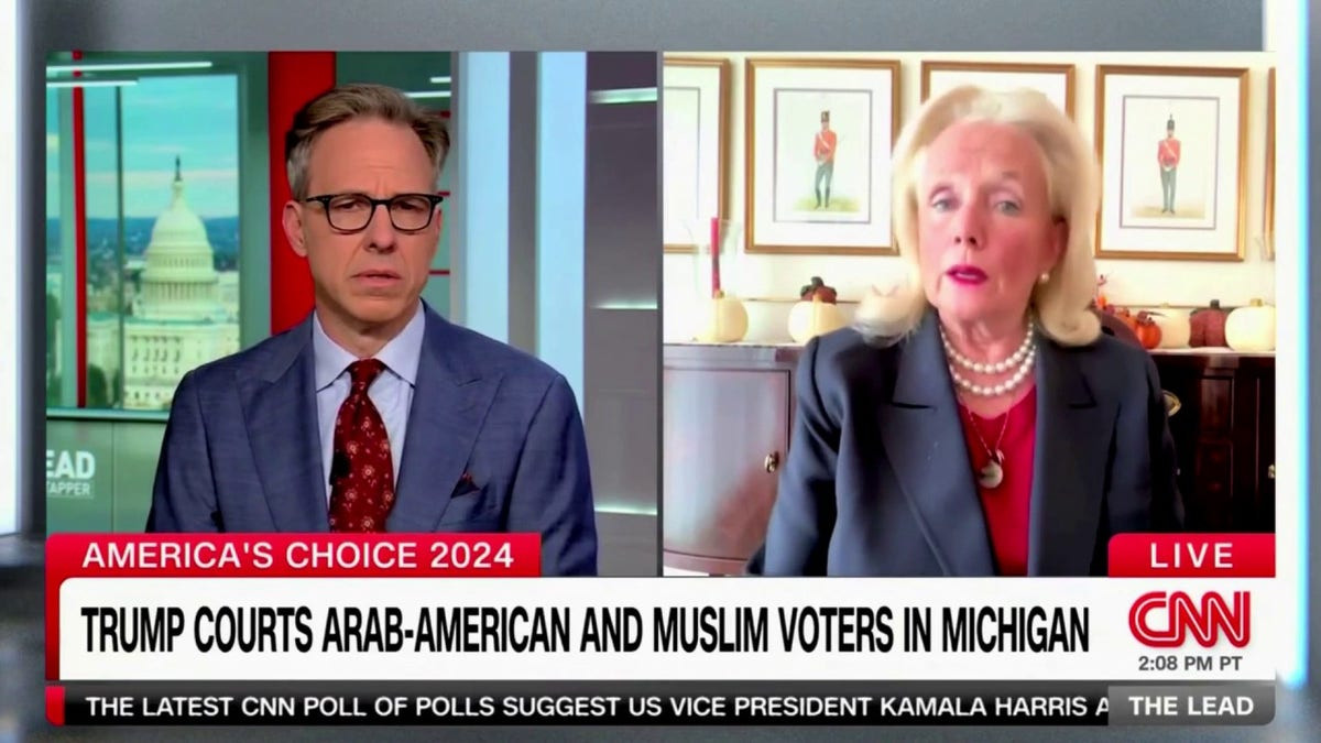 Rep. Dingell tells Jake Tapper he might 'have to visit' her in an internment camp if Trump wins  at george magazine