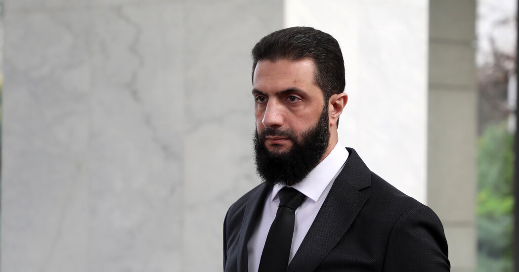 Syria’s Top Rebel Offers Hint of Timetable for Potetial Elections  at george magazine