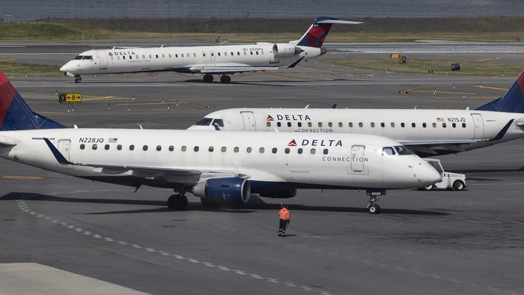 Delta plane wing clips runway during botched landing at LaGuardia Airport