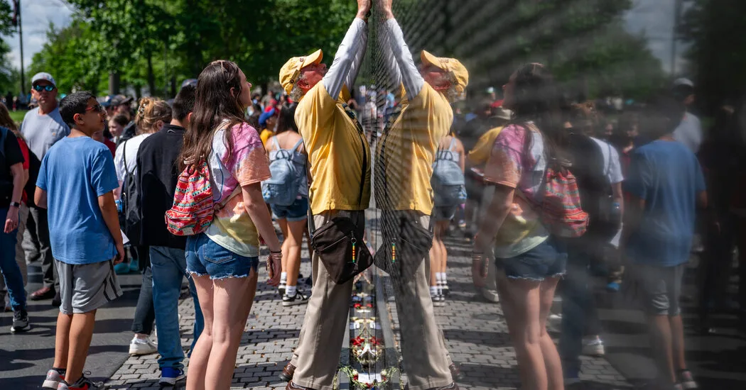 At Vietnam War Memorial, Familiar Names, Old Grief and a Kind of Peace  at george magazine