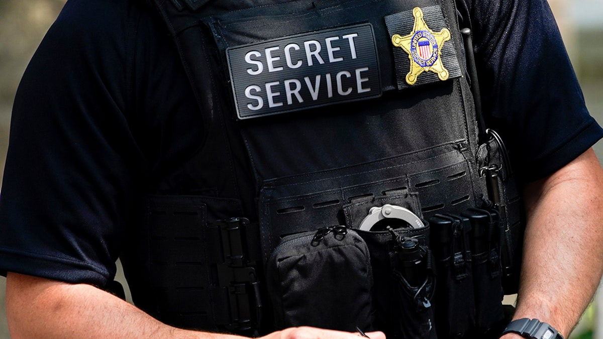 Two Secret Service officers suspended after brawl outside Obama's home  at george magazine