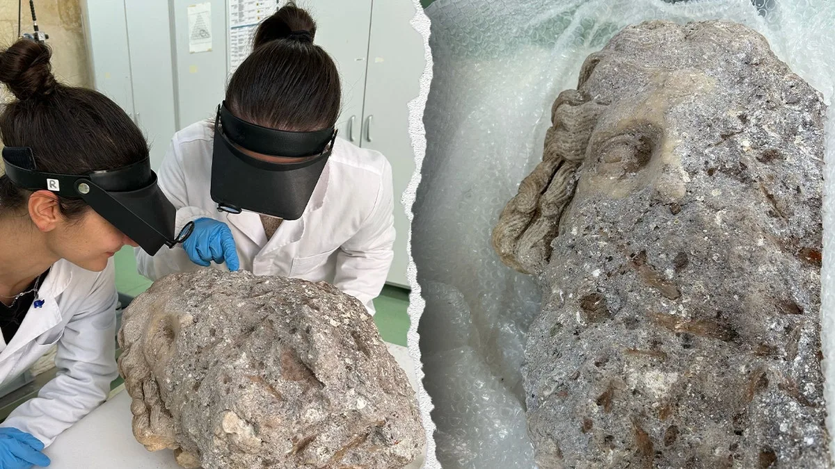 Archaeologists unearth strange head depicting Roman god beneath Catholic basilica  at george magazine
