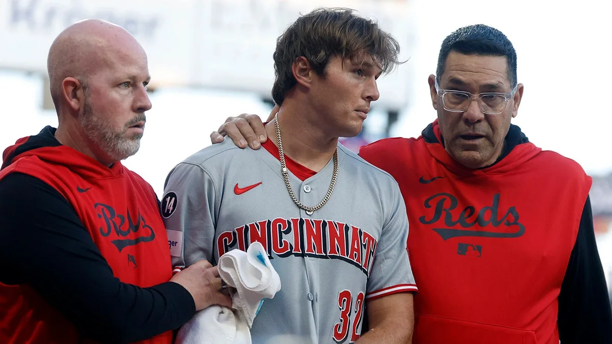 Reds rookie Tyler Callihan breaks arm crashing into wall while trying to make diving catch  at george magazine