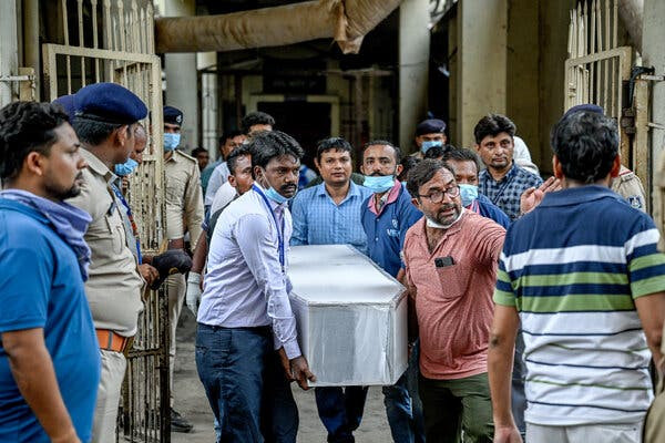 Grieving Relatives of India Air Crash Victims Wait for Bodies to Be Identified