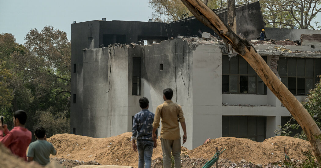 U.S. Investigators Arrive at Scene of Plane Crash in India  at george magazine