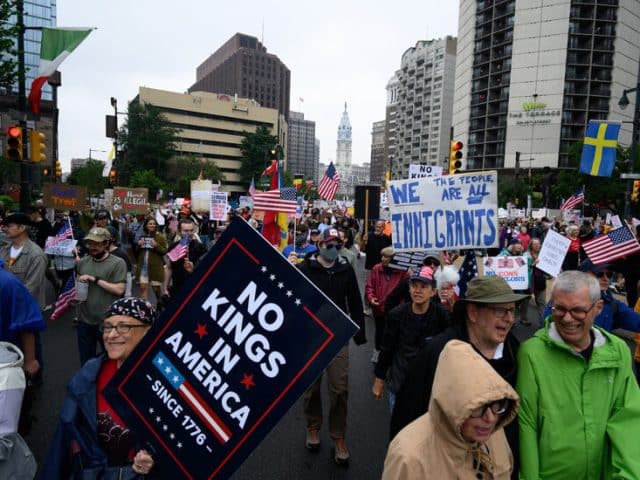 Heavily Armed Man at ‘No Kings’ Protest Had 13 Bombs at Home, Police Say