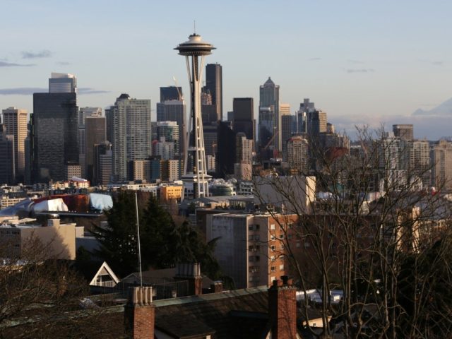 Passenger in custody after ‘direct threat’ to airplane shuts down Seattle Airport runways