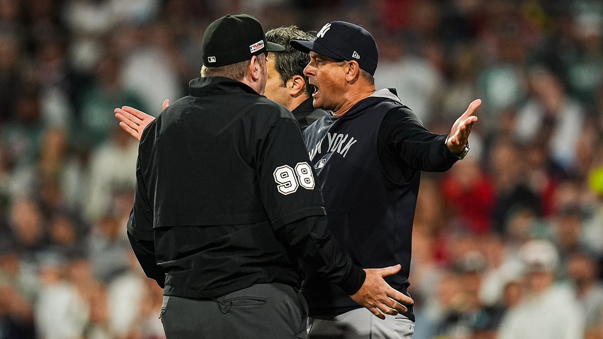 Yankees' Aaron Boone, DJ LeMahieu ejected over controversial foul ball in extra-innings loss to Red Sox  at george magazine