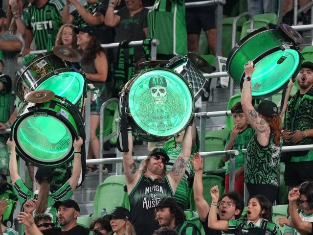 Soccer team band unfurls anti-ICE banners amid nationwide protests