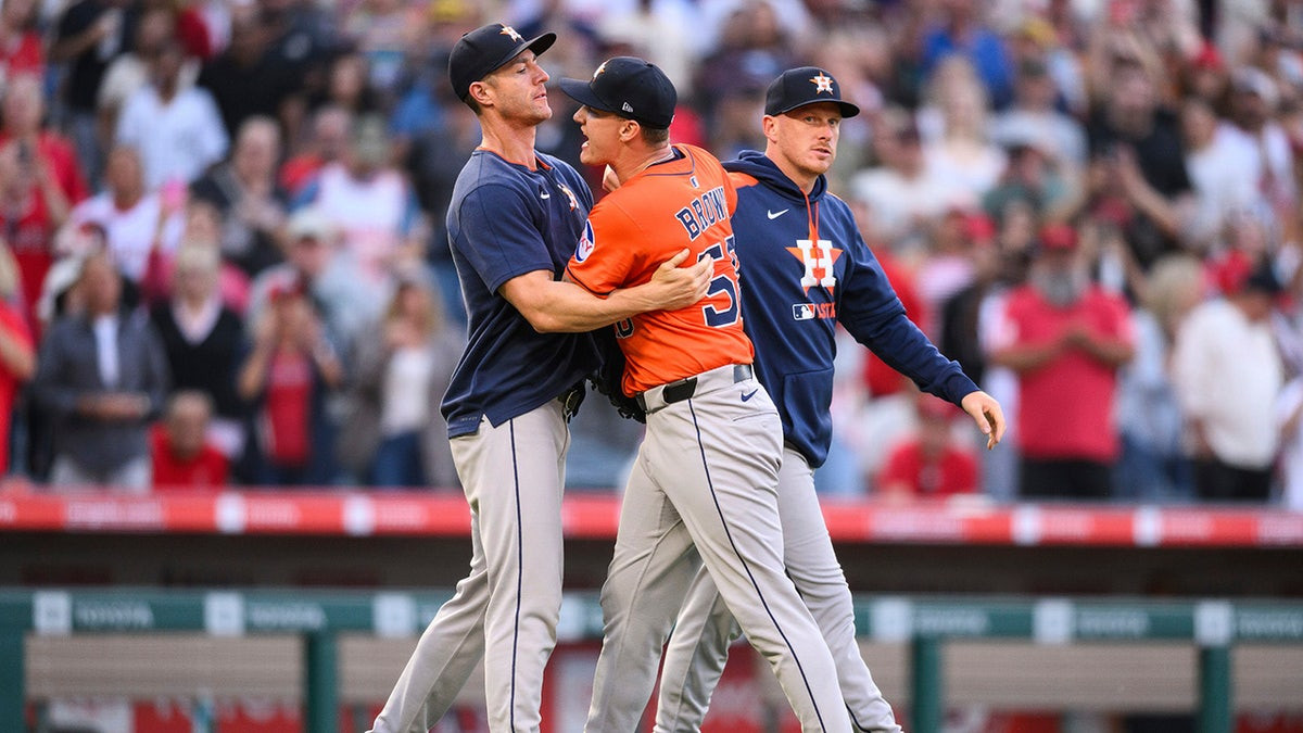 Astros pitcher confronts Angels shortstop after hitting him with pitch, sparking bench-clearing scene  at george magazine