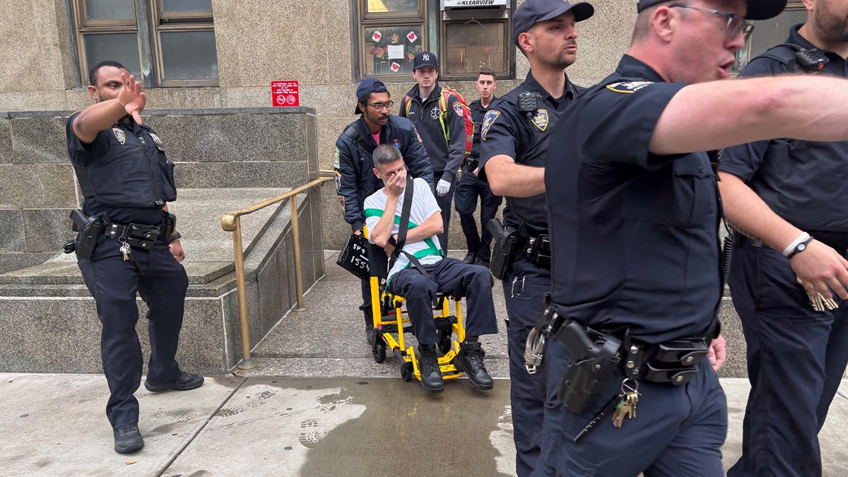 2 NYC court officers stabbed at site of iconic trials  at george magazine