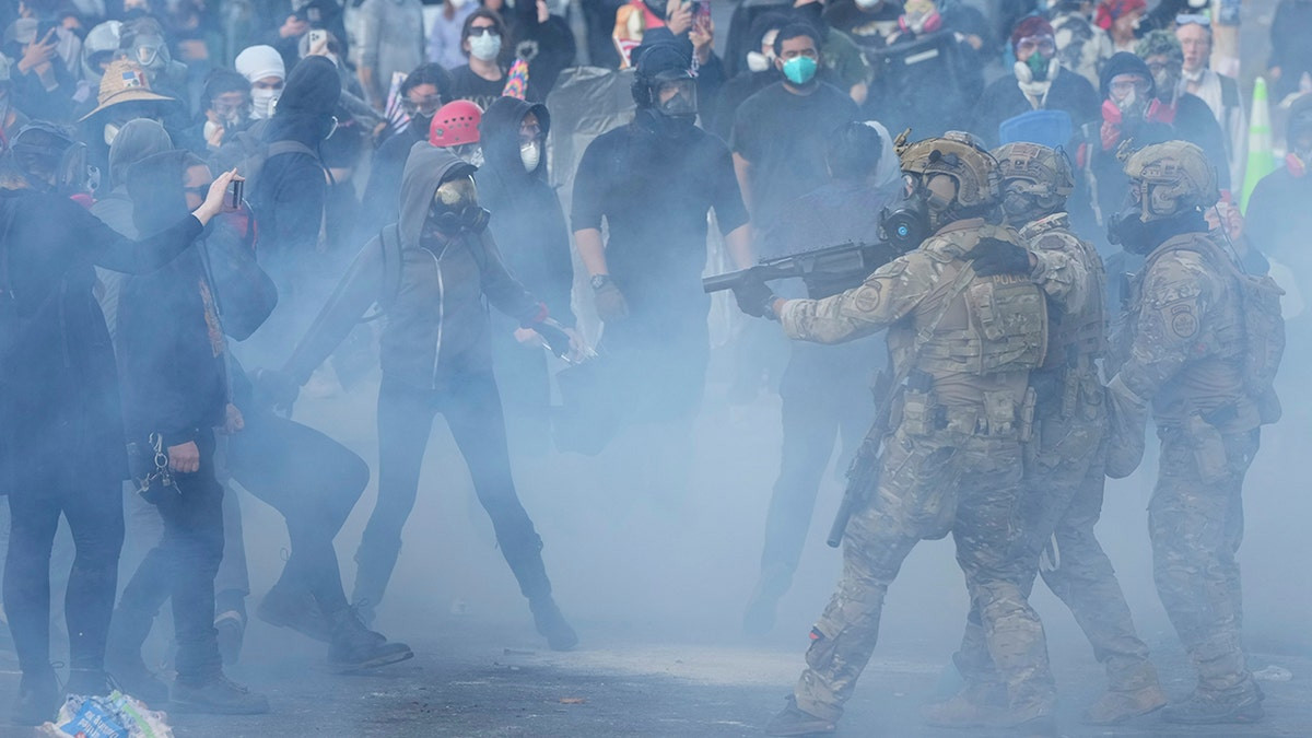 Multiple arrests near Portland ICE building after police declare riot  at george magazine