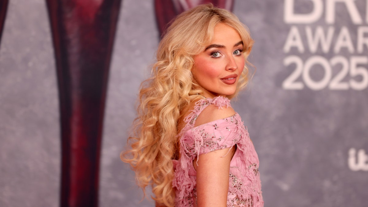 Sabrina Carpenter shares new album cover 'approved by God' after backlash over racy image  at george magazine