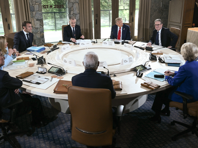 Meloni caught giving ‘eye roll of the century’ while Macron whispered in her ear during high-stakes G7 meeting