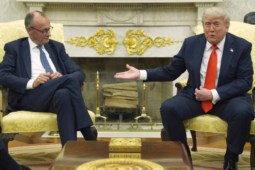 Trump tempers reality TV strategy in Oval Office meeting with German chancellor  at george magazine