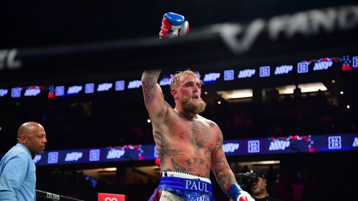Jake Paul tells booing crowd 'shut the f--k up' after beating Julio César Chávez  at george magazine