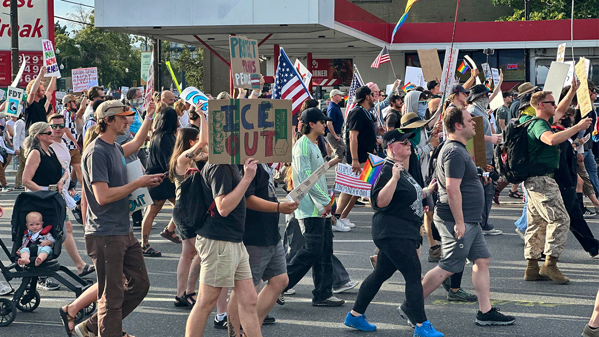 Person of interest in custody after shooting at 'No Kings' demonstration in Utah  at george magazine