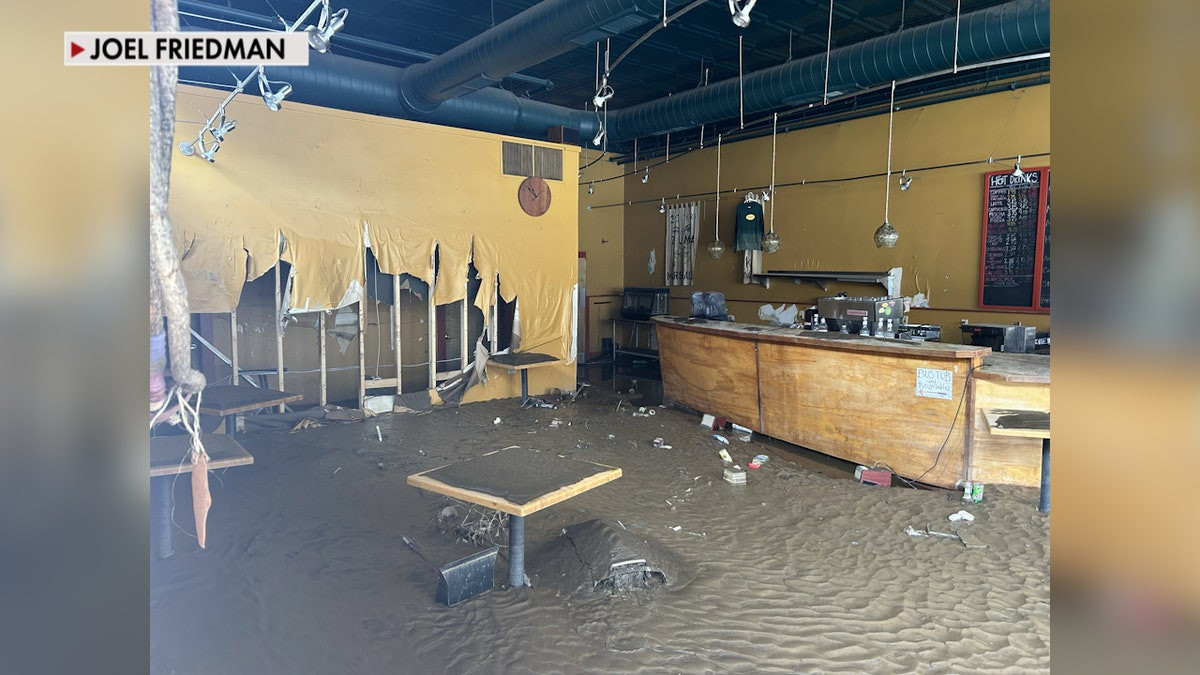 Helene-ravaged river town reopens for visitors: 'It felt like victory'  at george magazine