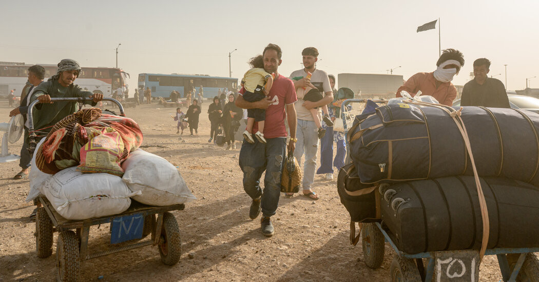 Iran Carries Out Mass Expulsion of Afghan Refugees  at george magazine