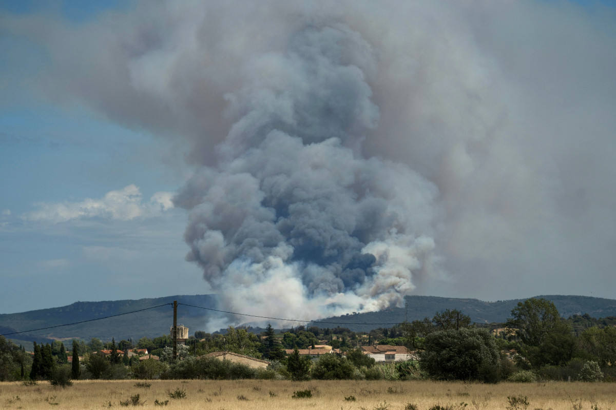 Wildfires Burn in Spain and France After Blistering Heat Wave  at george magazine