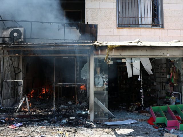 Smell of Death Lingers in Syrian City After Spasm of Violence