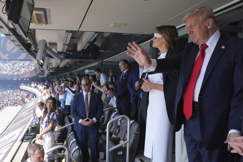 Trump waves to fans as he takes in FIFA Club World Cup final  at george magazine