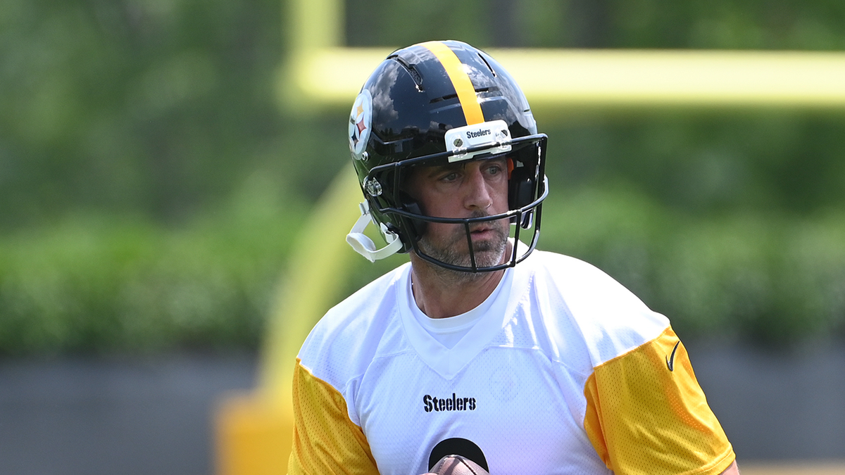 Aaron Rodgers refuses to sign autograph for fan because he didn't know enough details about a 2005 game  at george magazine