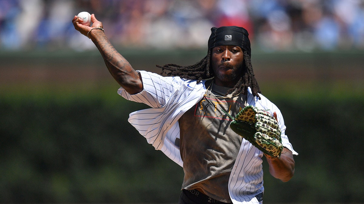 Saints star Alvin Kamara asks for do-over after terrible first pitch before Cubs-Cardinals game  at george magazine
