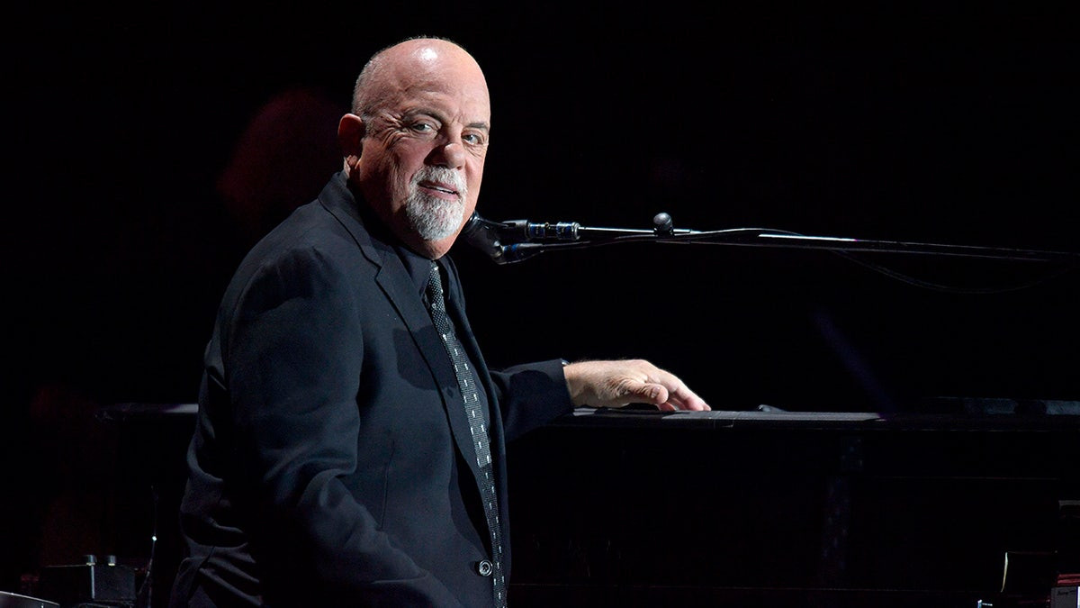 Billy Joel admits affair made him feel 'like a homewrecker,’ says he deserved being 'punched in the nose'  at george magazine