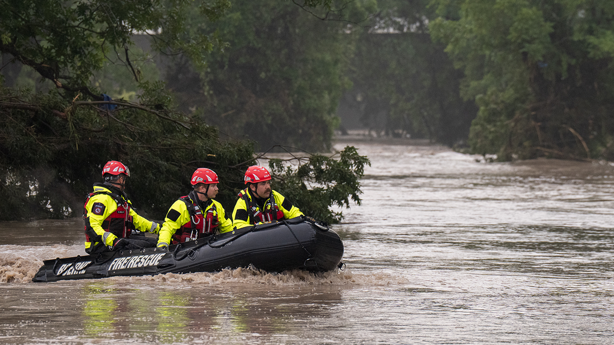 Texas family helps rescue woman clinging to tree after being swept 20 miles downriver  at george magazine