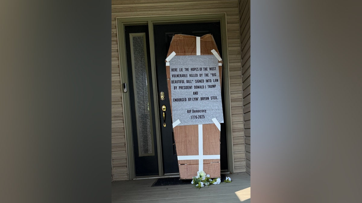Protesters caught on camera delivering coffin to GOP congressman's front door in mock funeral procession  at george magazine