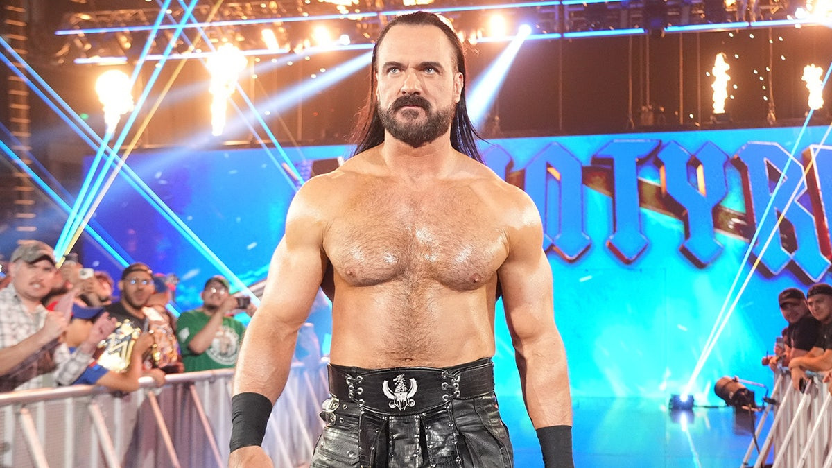 WWE star Drew McIntyre dishes on how he finally got his 'bored at work' shirt made  at george magazine