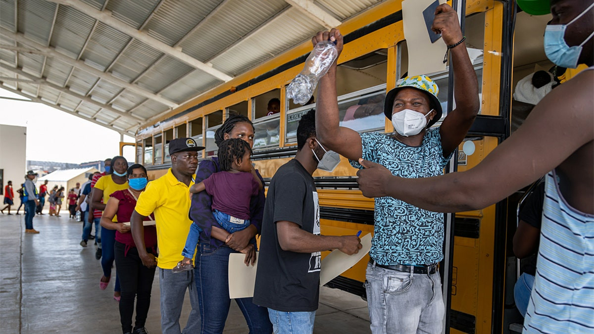 Federal judge blocks Trump's immigration policy in shocking decision on Haitian protections  at george magazine