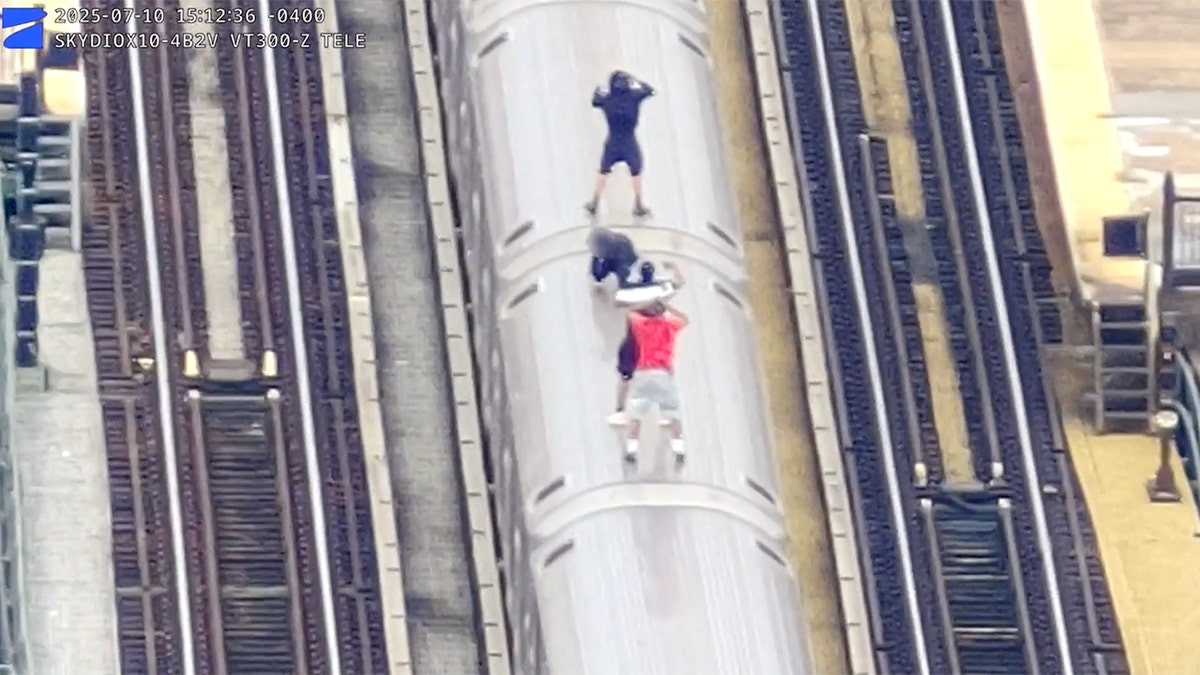 Drone surveillance catches kids in dangerous high-speed stunt atop moving subway train in New York City  at george magazine