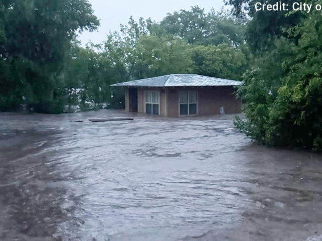 Texas river flood leaves at least 13 dead and 20 children missing; camp evacuated by helicopter