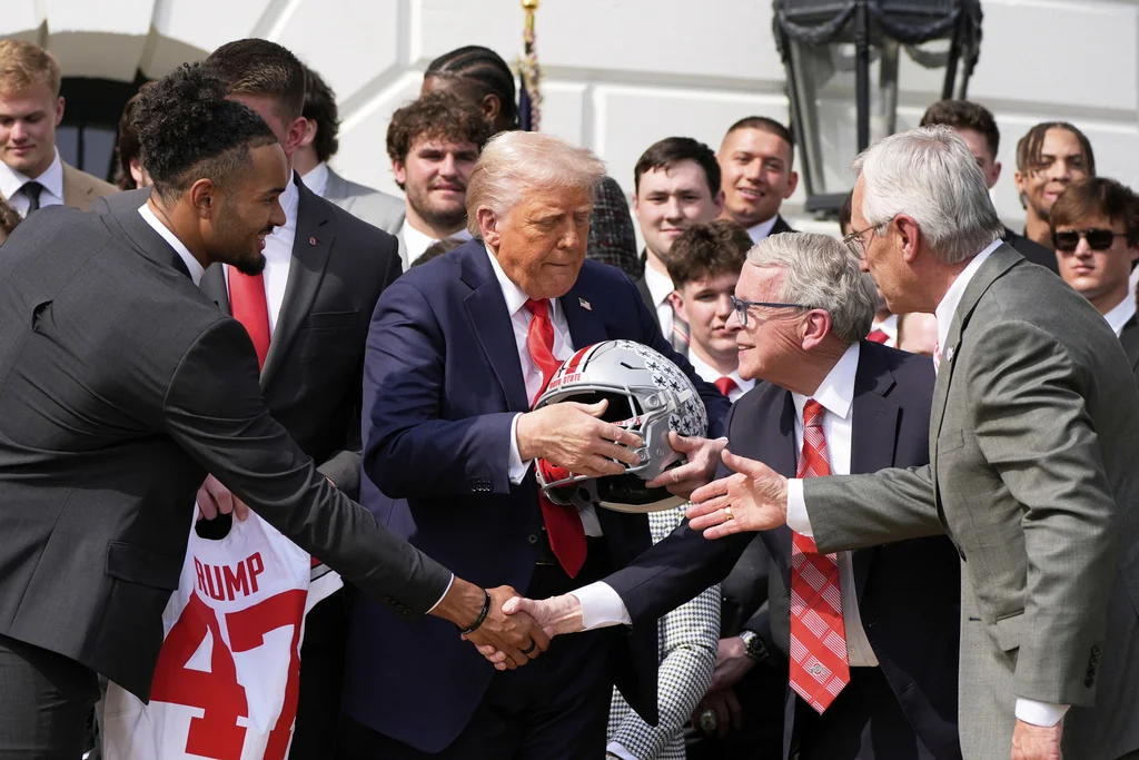 Trump signs executive order aiming to ‘save college athletics’  at george magazine