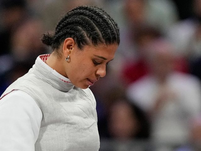 French Olympic fencer’s kiss contamination defense holds up in court as she’s cleared of doping violation