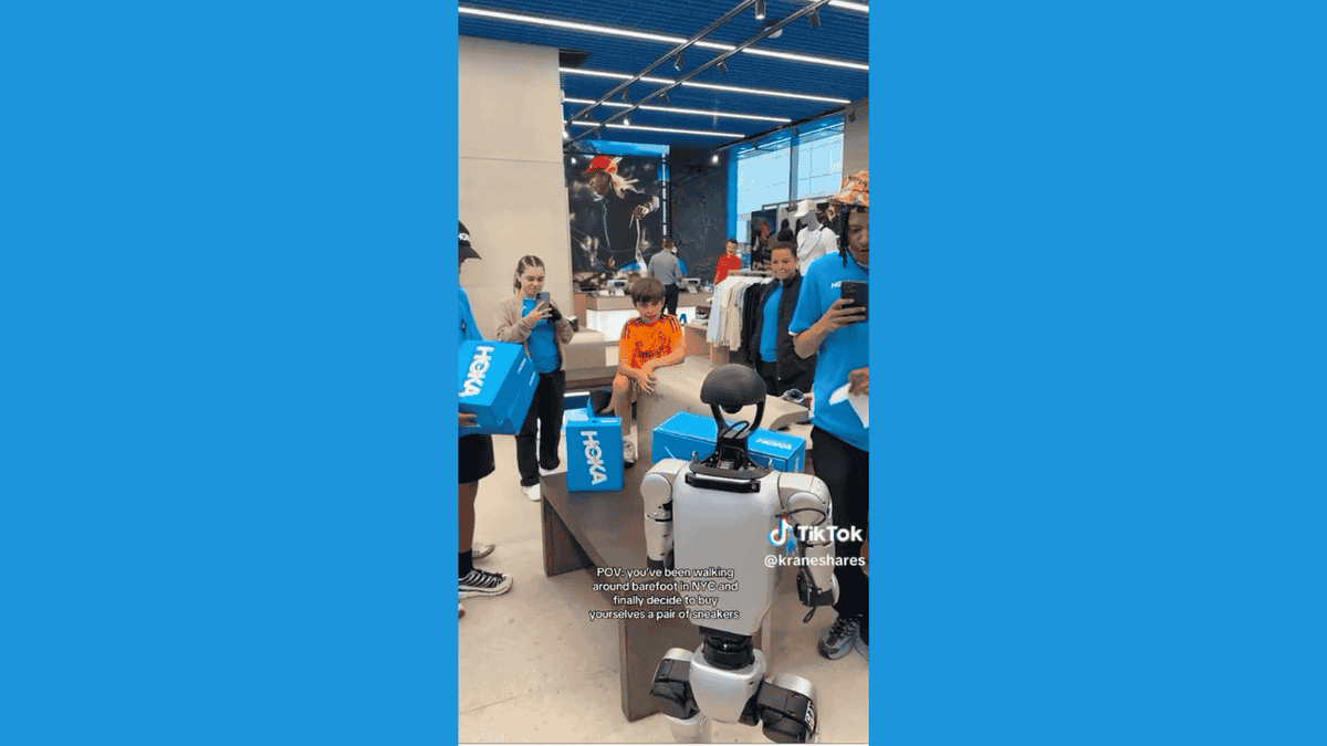 Humanoid robot turns heads at NYC sneaker store  at george magazine