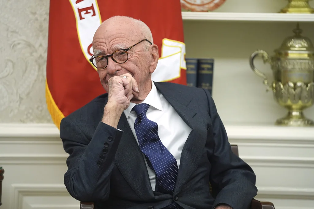 Trump and Murdoch cut deal not to expedite deposition in Wall Street Journal lawsuit  at george magazine