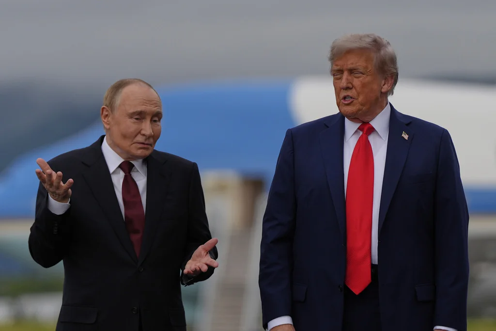 Putin taps ear and shrugs when asked whether he would stop ‘killing civilians’  at george magazine