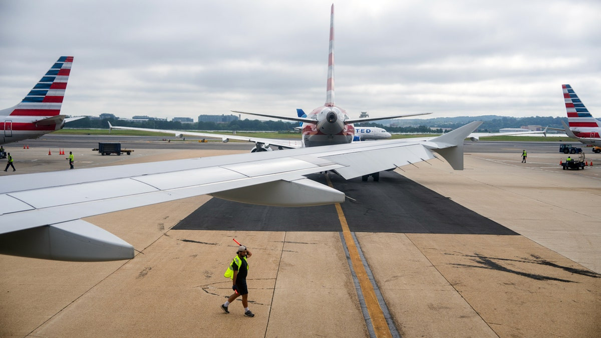 Smoke from unknown passenger device forces emergency landing of American Airlines flight to Washington-Dulles  at george magazine